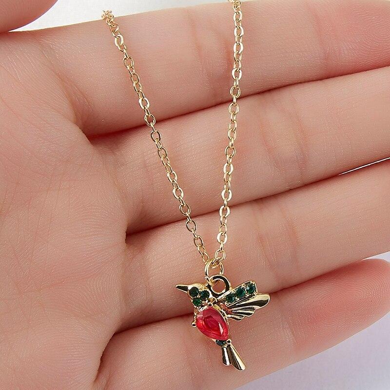 Fine necklace with hummingbird pendant made of enamel and zirconia