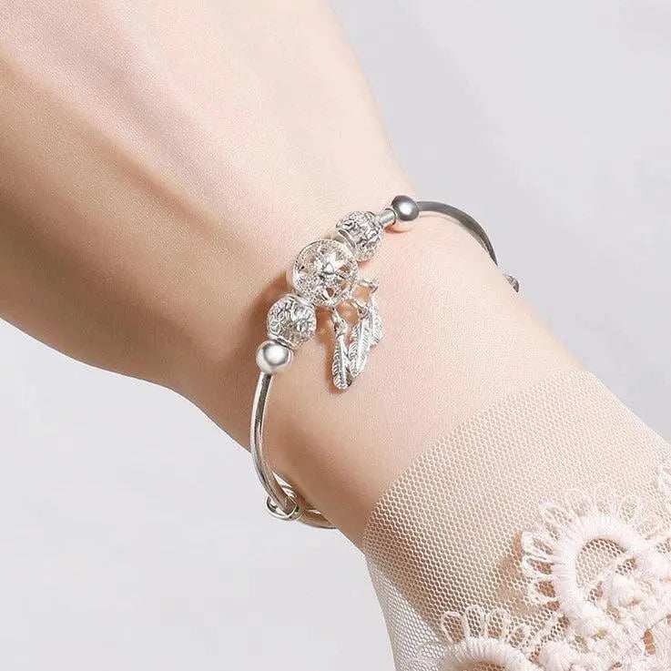 Adjustable bracelet with triple leaf charms made of sterling silver
