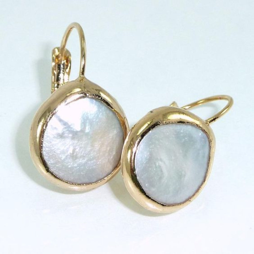 Vintage gold earrings with beautiful white stone