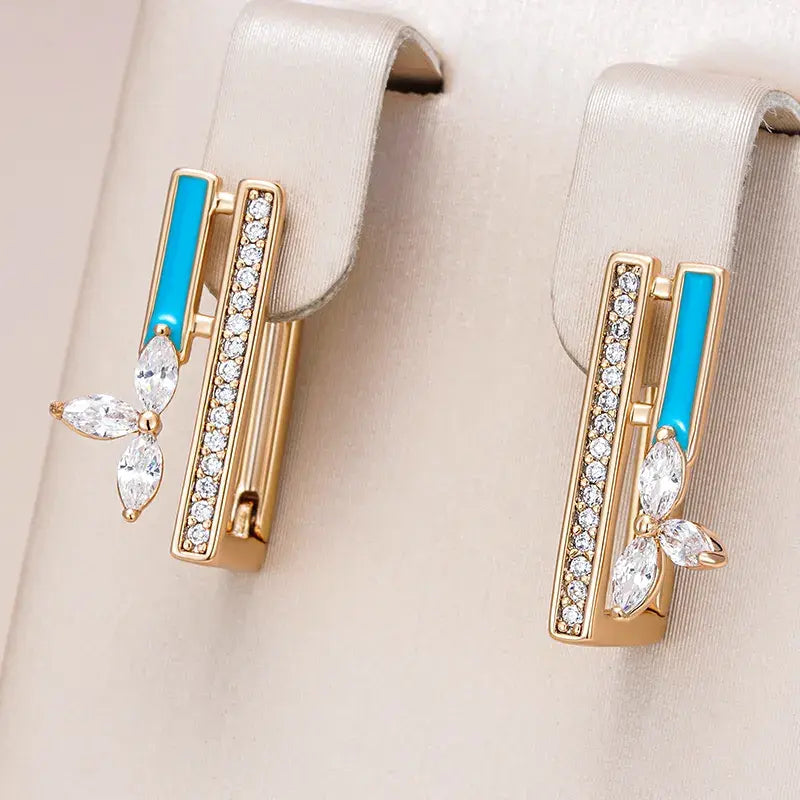 Elegant earrings with blue enamel and zirconia in gold