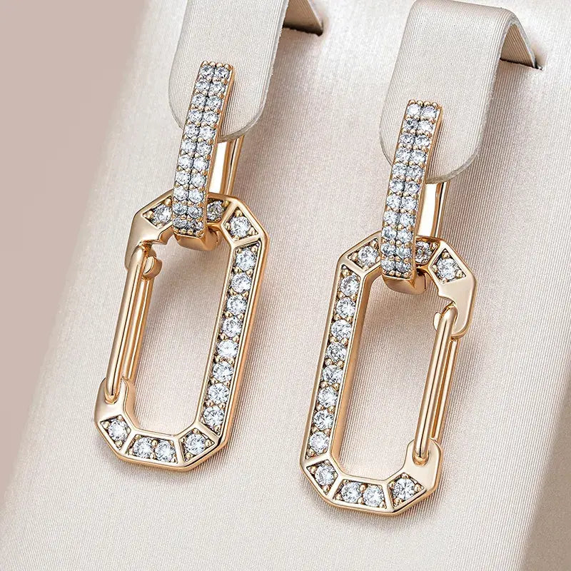 Elegant, shiny earrings with golden recesses