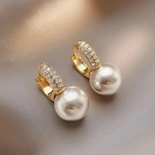 Pearl earrings with rhinestones