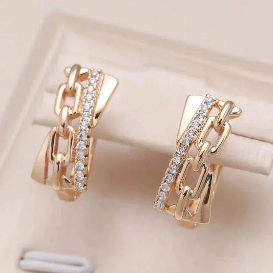 Shiny earrings with chains in gold